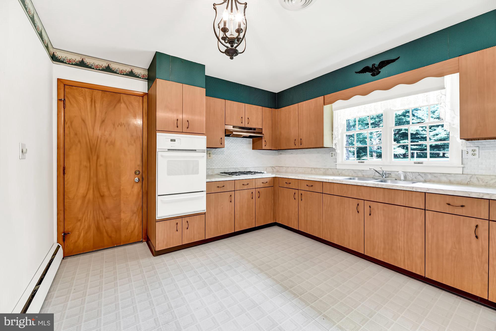 12814 Dover Road Reisterstown, MD 21136 - Photo 12 of 28 Kitchen with door to garage