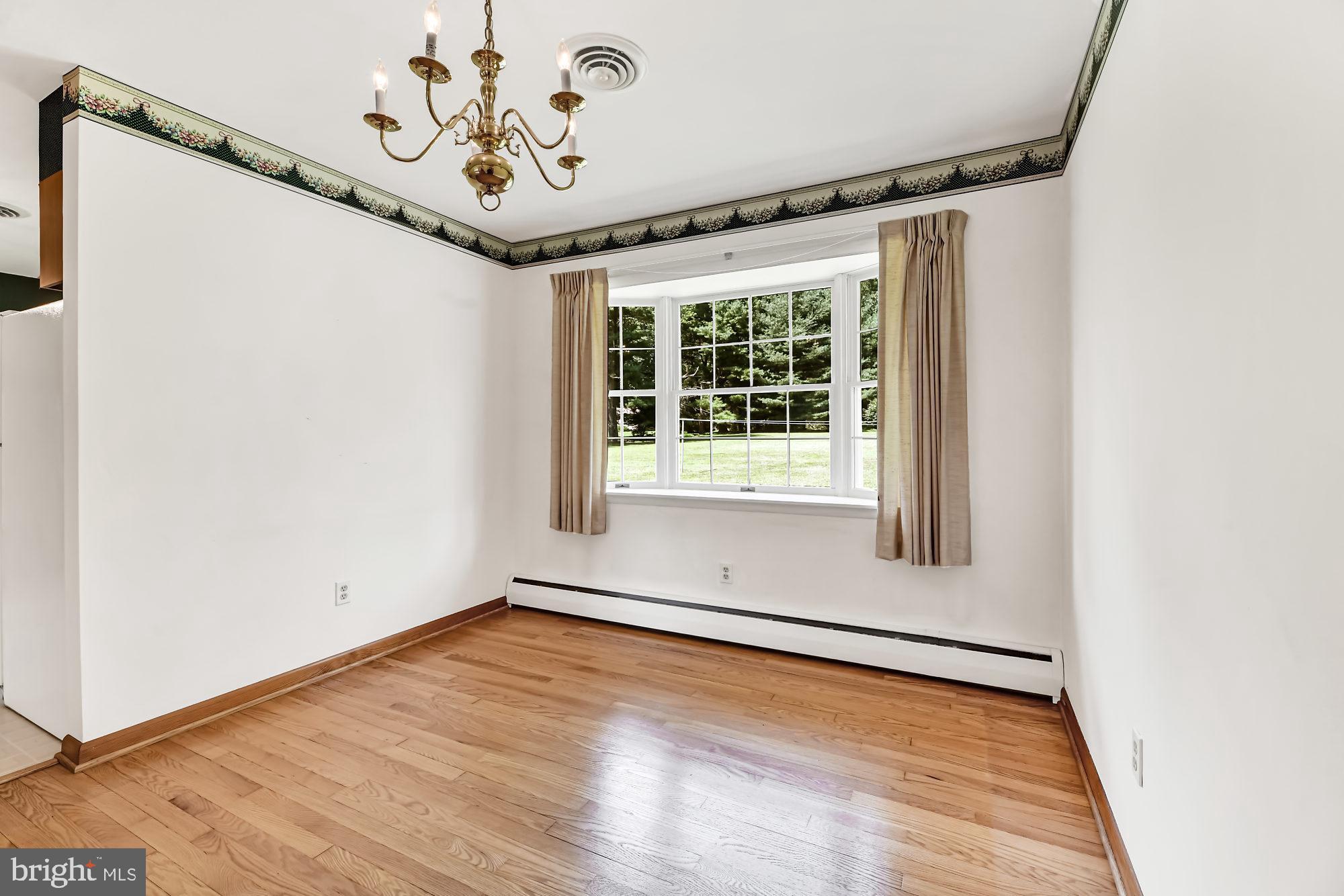 12814 Dover Road Reisterstown, MD 21136 - Photo 8 of 28 Large Bay window overlooks back yard