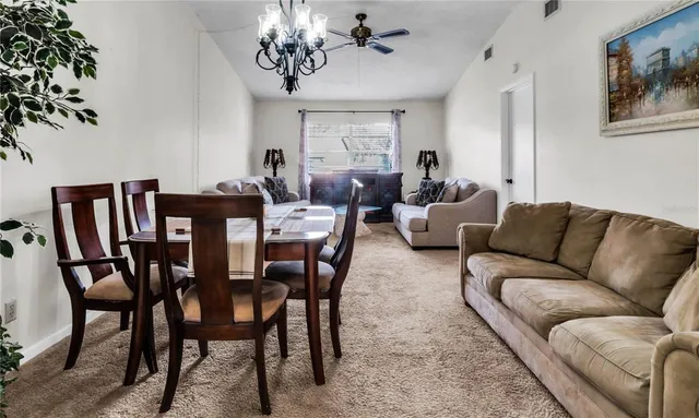 a view of a livingroom and dining room