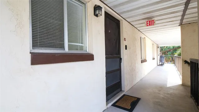 a view of hallway with living room