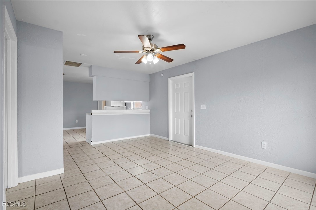 5449 Tenth Avenue Fort Myers, FL 33907 - Photo 6 of 18 a view of a kitchen with marble top and white cabinet