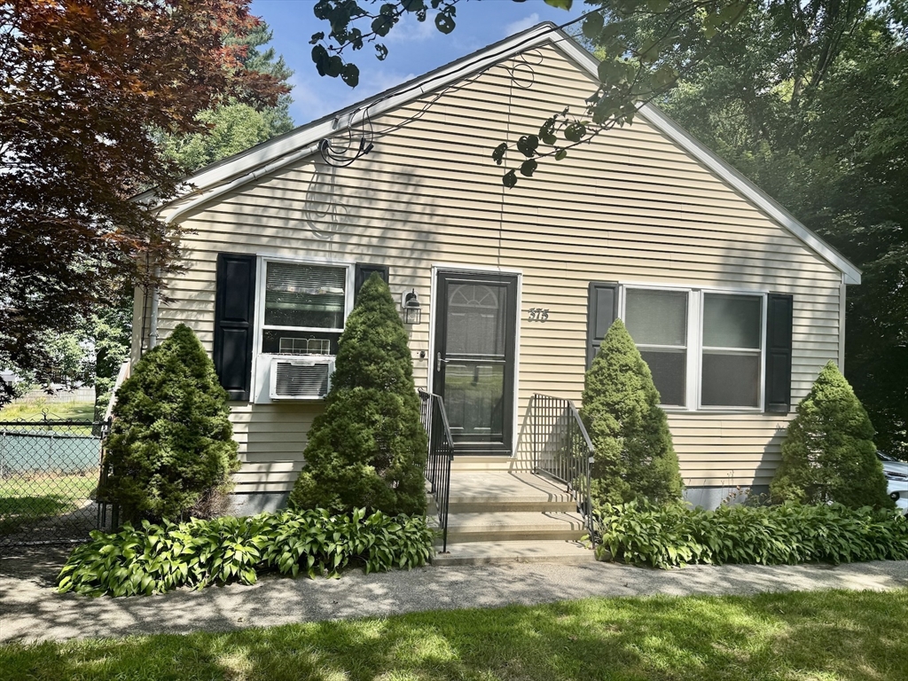 375 Thompson Road Webster, MA 01570 - Photo 1 of 21 a view of a house with a yard and potted plants
