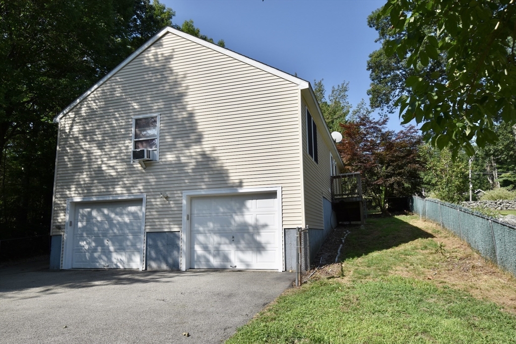375 Thompson Road Webster, MA 01570 - Photo 3 of 21 a view of a house with a yard