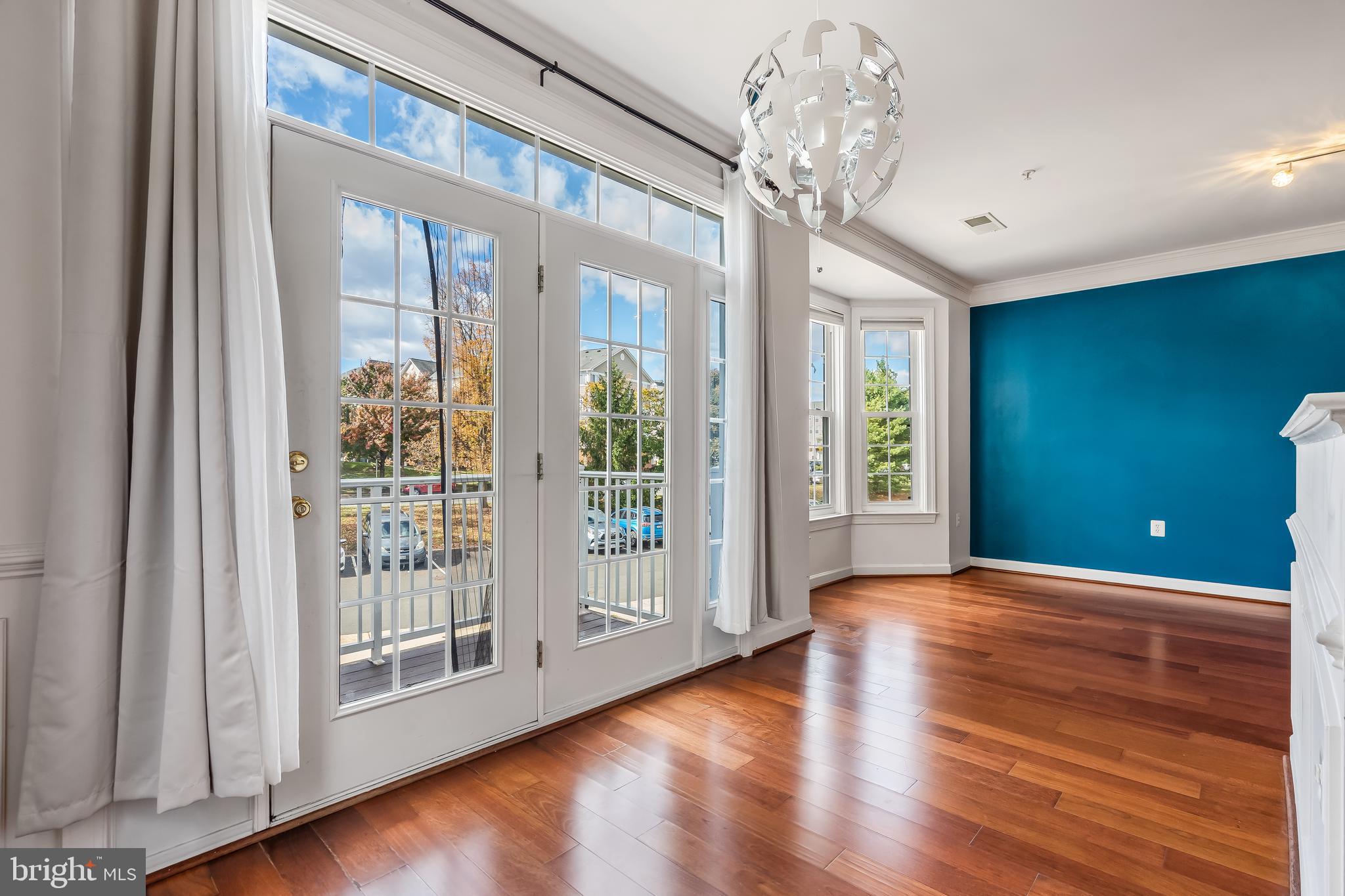 13600 Salk Street, Unit 131 Herndon, VA 20171 - Photo 11 of 34 a view of entryway with wooden floor