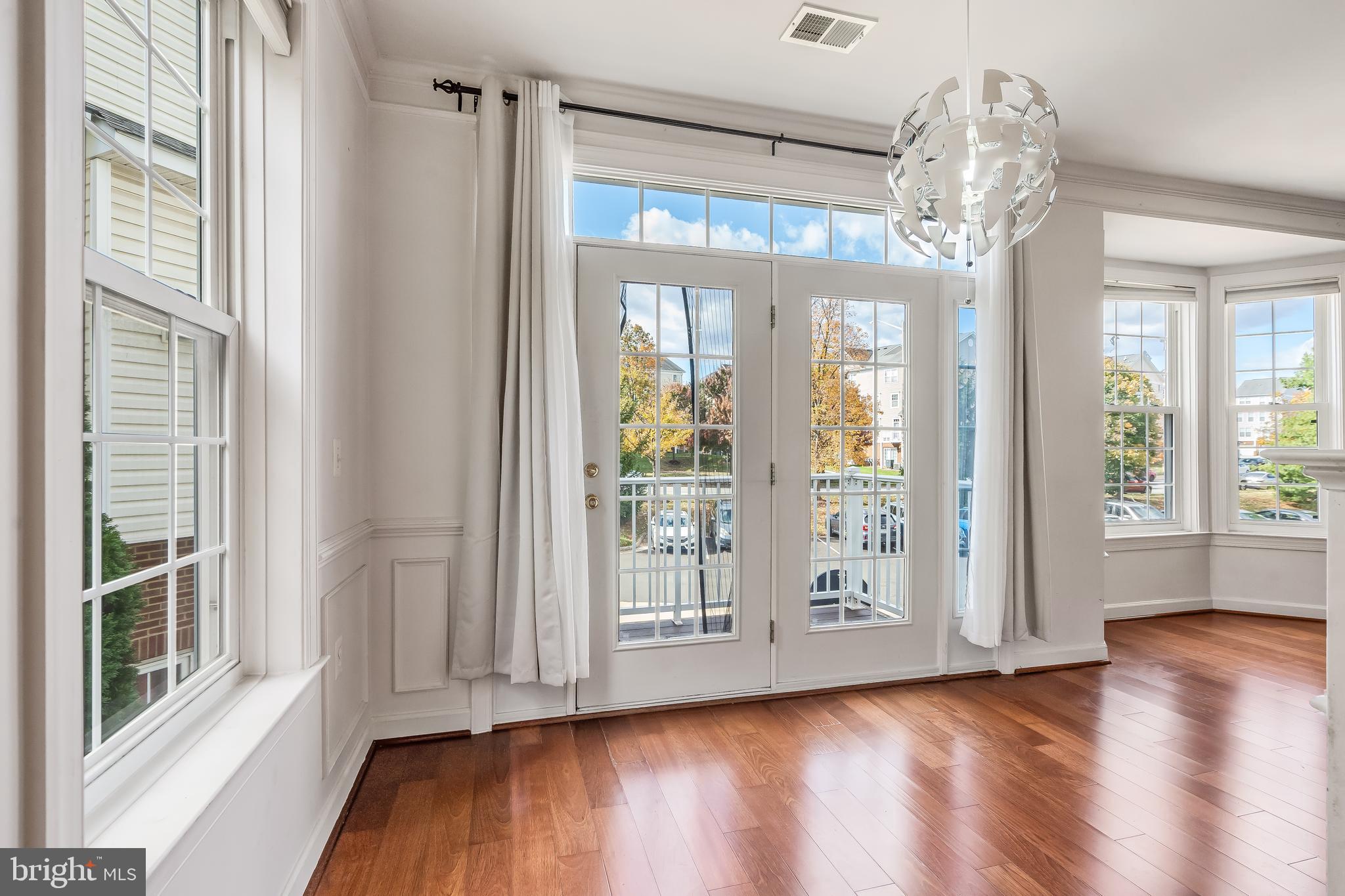 13600 Salk Street, Unit 131 Herndon, VA 20171 - Photo 13 of 34 a view of entryway with wooden floor