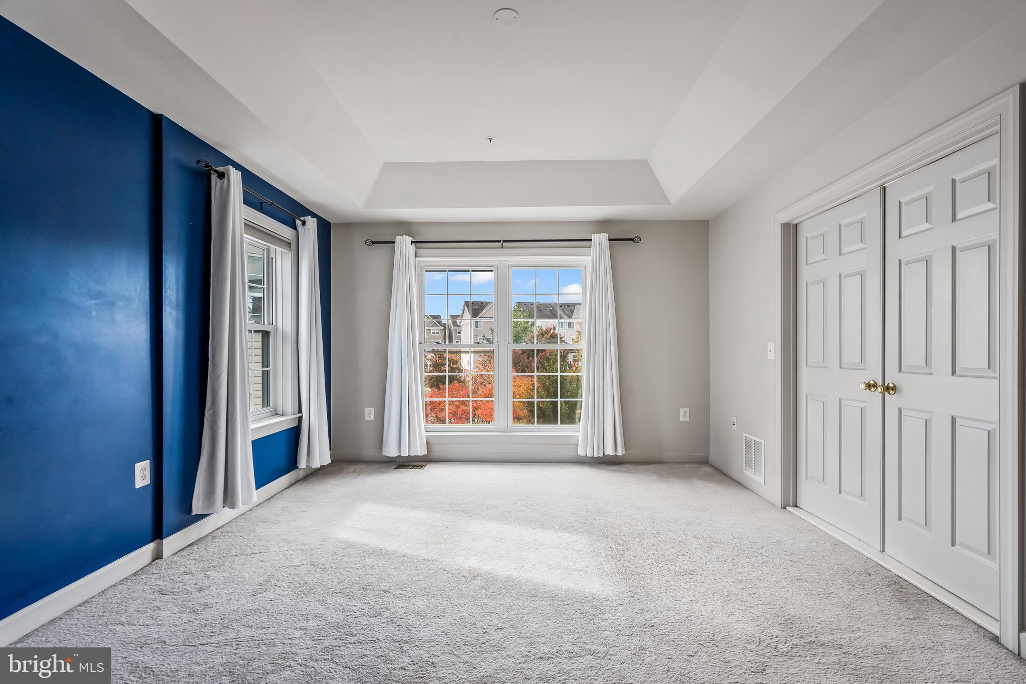 13600 Salk Street, Unit 131 Herndon, VA 20171 - Photo 21 of 34 a view of an empty room with a window