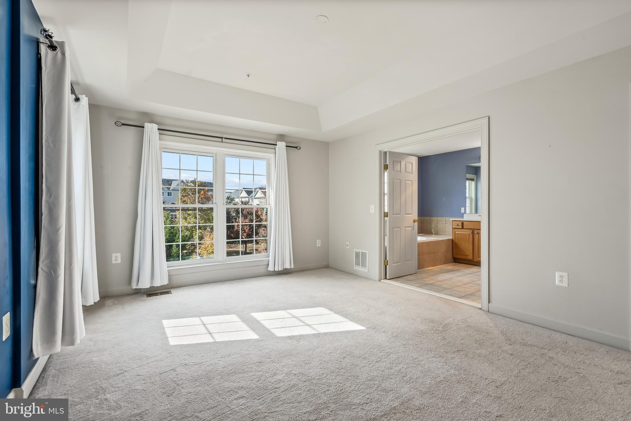 13600 Salk Street, Unit 131 Herndon, VA 20171 - Photo 22 of 34 a view of a room with a large window and kitchen view
