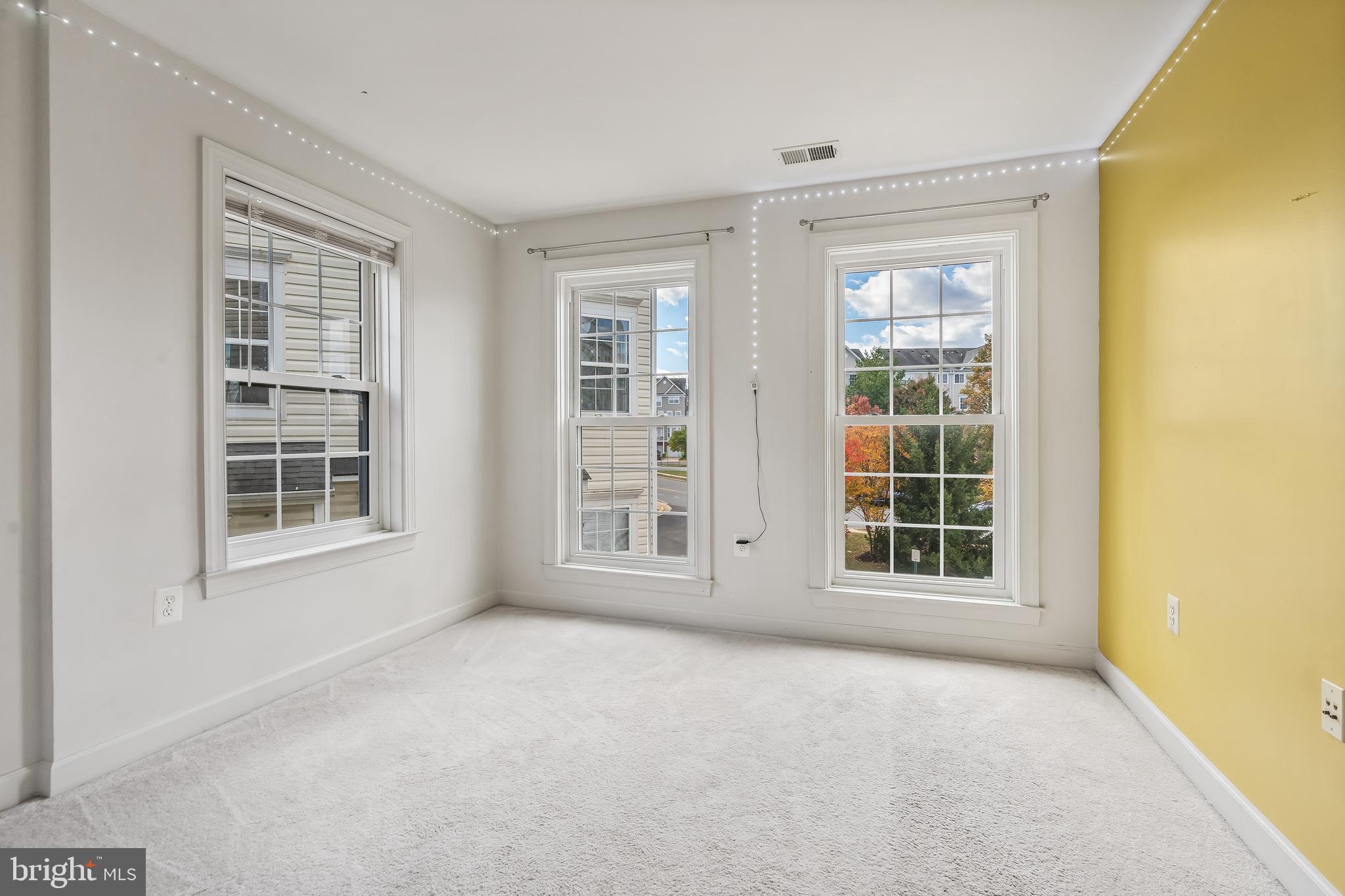 13600 Salk Street, Unit 131 Herndon, VA 20171 - Photo 31 of 34 an empty room with windows