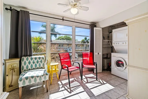 a room with furniture and a window