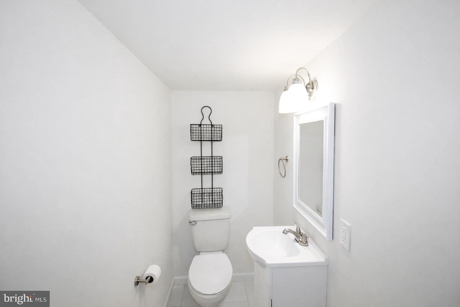 416 North Duke Street Hummelstown, PA 17036 - Photo 26 of 26 a bathroom with a toilet sink and mirror