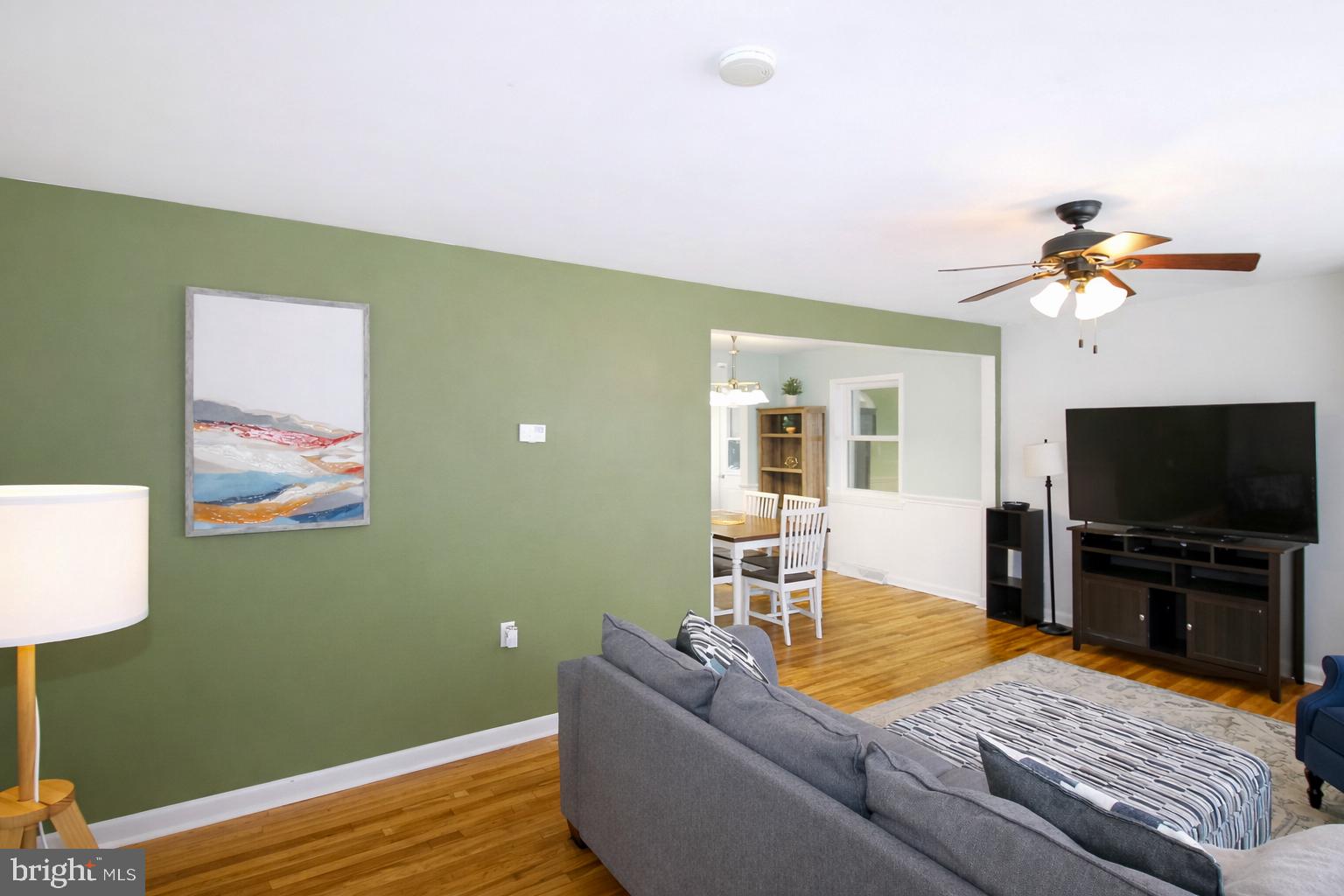 416 North Duke Street Hummelstown, PA 17036 - Photo 3 of 26 a living room with furniture and a flat screen tv