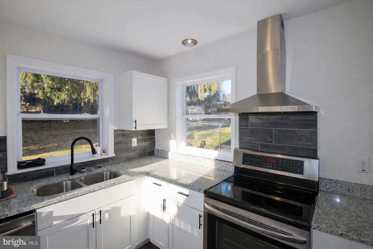 416 North Duke Street Hummelstown, PA 17036 - Photo 10 of 26 a kitchen with a stove and a sink