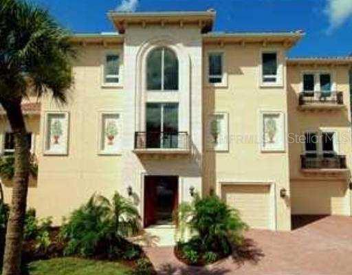3935 North Shell Road Sarasota, FL 34242 - Photo 1 of 1 a front view of a house with a yard