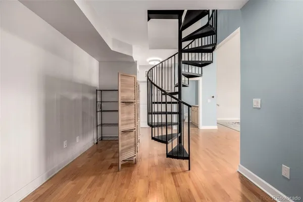 a view of entryway with wooden floor