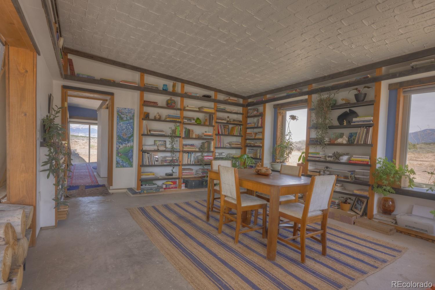 6592 Slegers Road Fort Garland, CO 81133 - Photo 12 of 30 a view of a livingroom with furniture and window