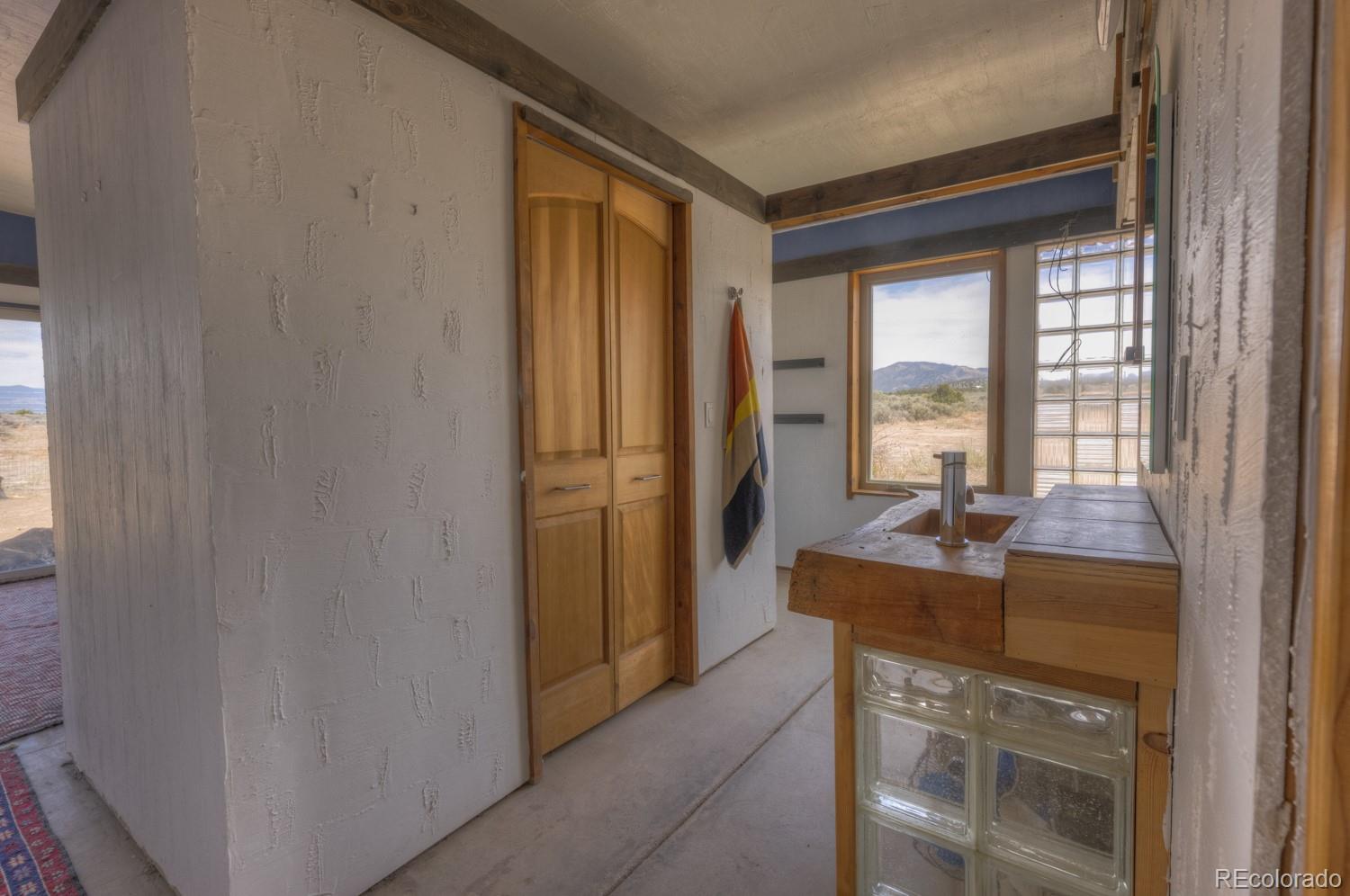 6592 Slegers Road Fort Garland, CO 81133 - Photo 15 of 30 a dining room with a table and chairs