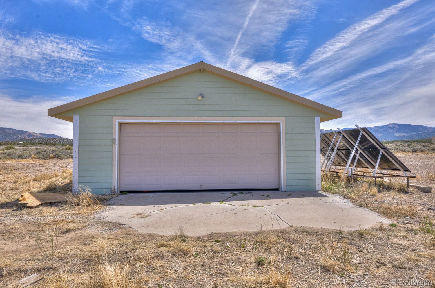 6592 Slegers Road Fort Garland, CO 81133 - Photo 22 of 30 a view of garage yard