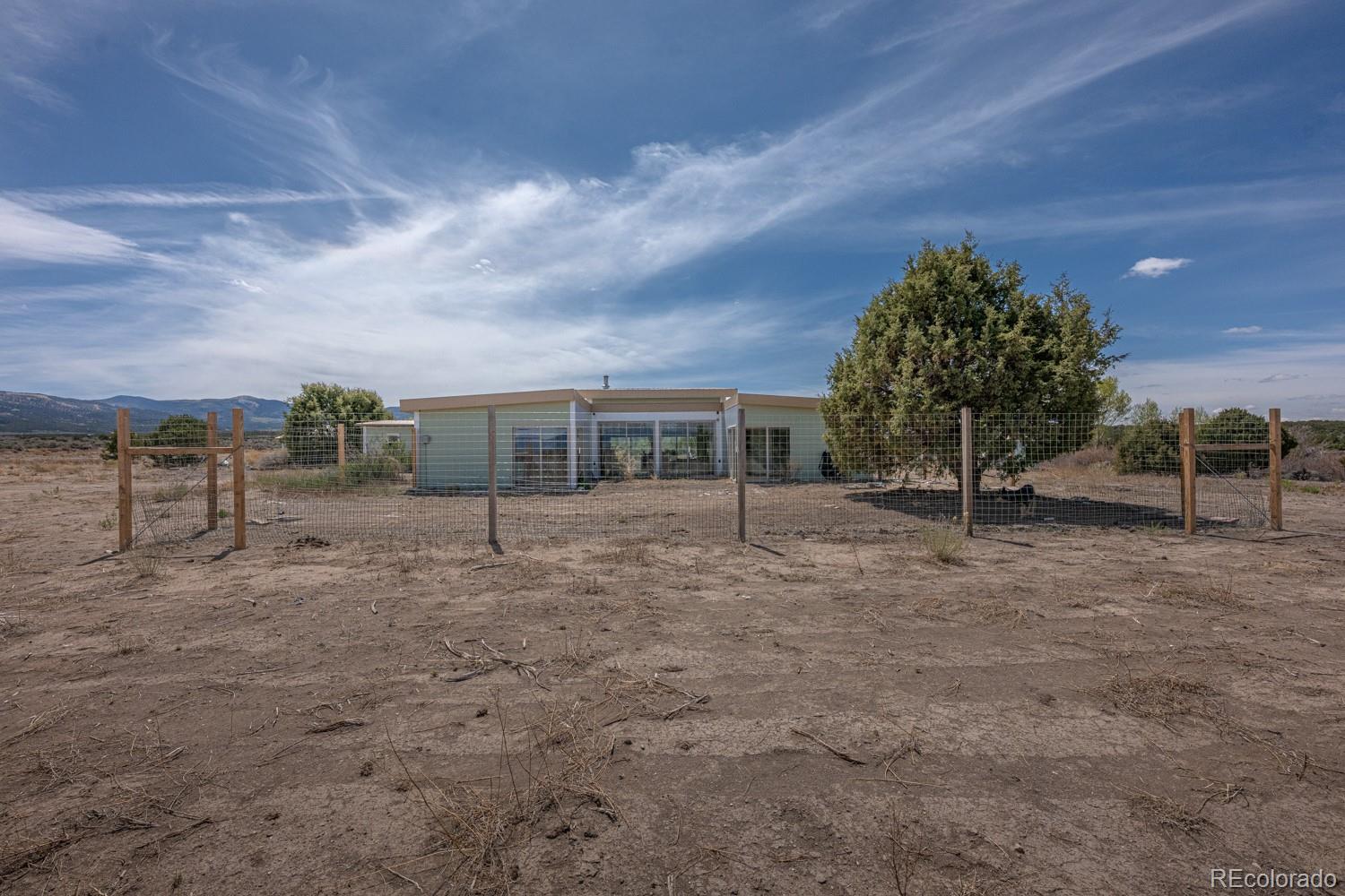 6592 Slegers Road Fort Garland, CO 81133 - Photo 27 of 30 a view of house with outdoor space