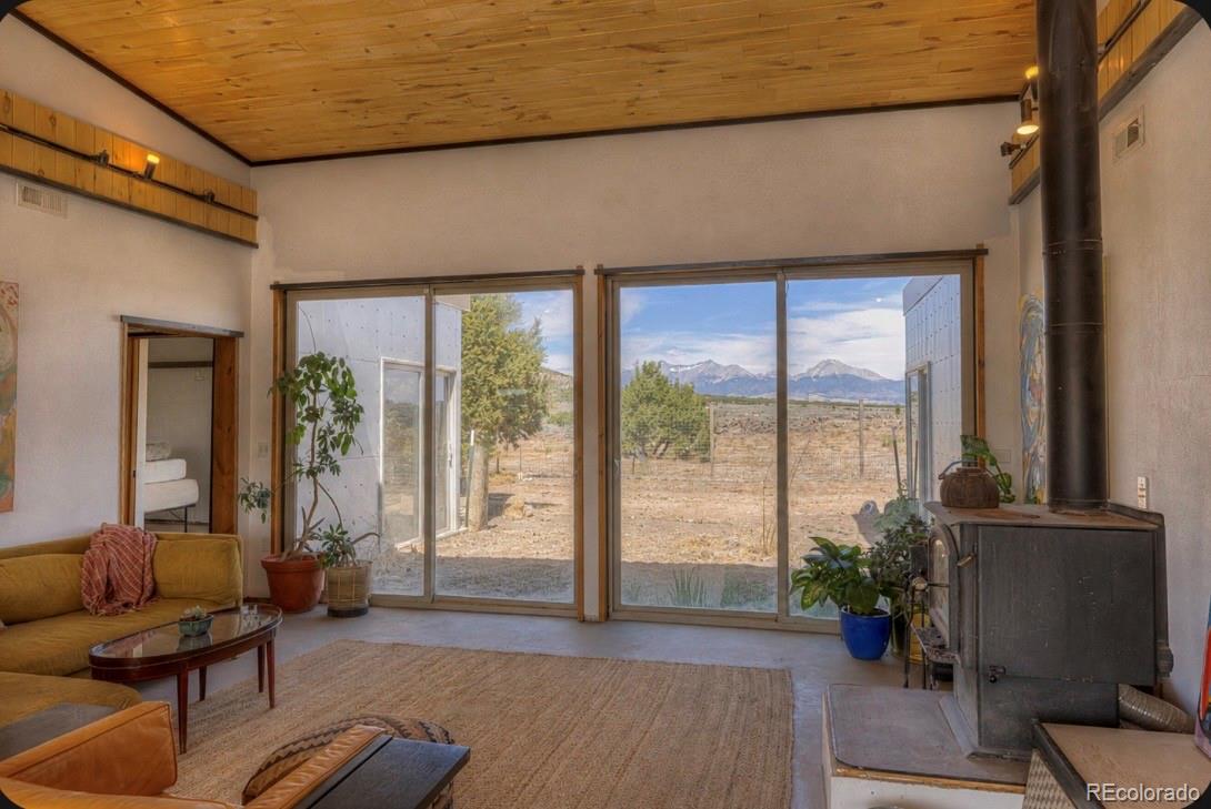6592 Slegers Road Fort Garland, CO 81133 - Photo 5 of 30 a living room with furniture and a window