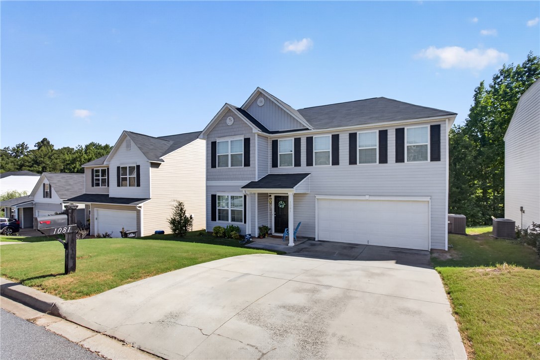 1081 Edenbrooke Circle Anderson, SC 29621 - Photo 41 of 46 A well-maintained suburban dwelling with a spacious concrete driveway and tidy landscaping.