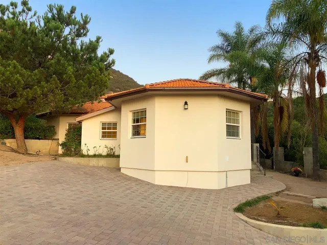 a view of a house with a outdoor space