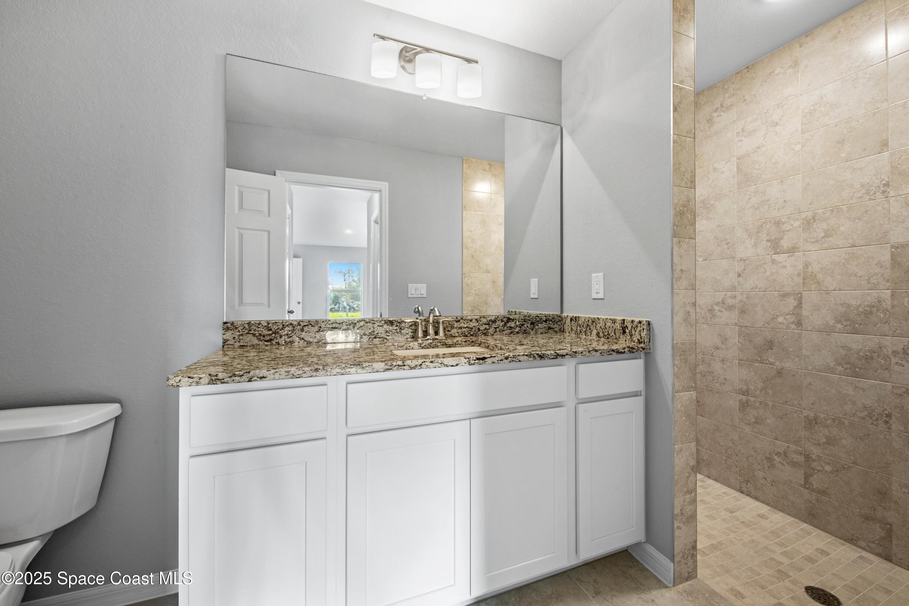 311 La Croix Road Southwest Palm Bay, FL 32908 - Photo 11 of 15 SL_CayoCosta_PrimaryBath