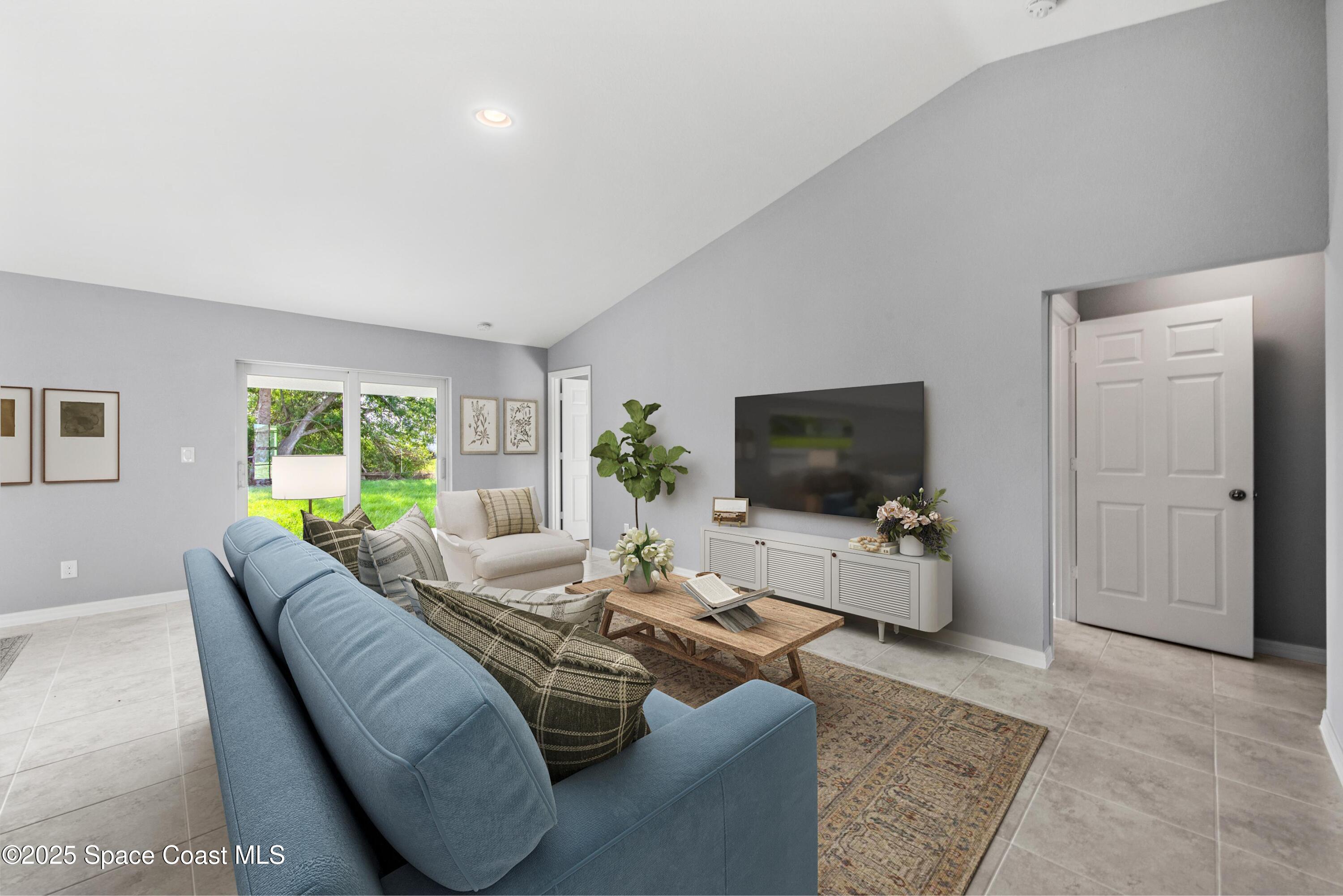 311 La Croix Road Southwest Palm Bay, FL 32908 - Photo 4 of 15 SL_CayoCosta_GreatRoom