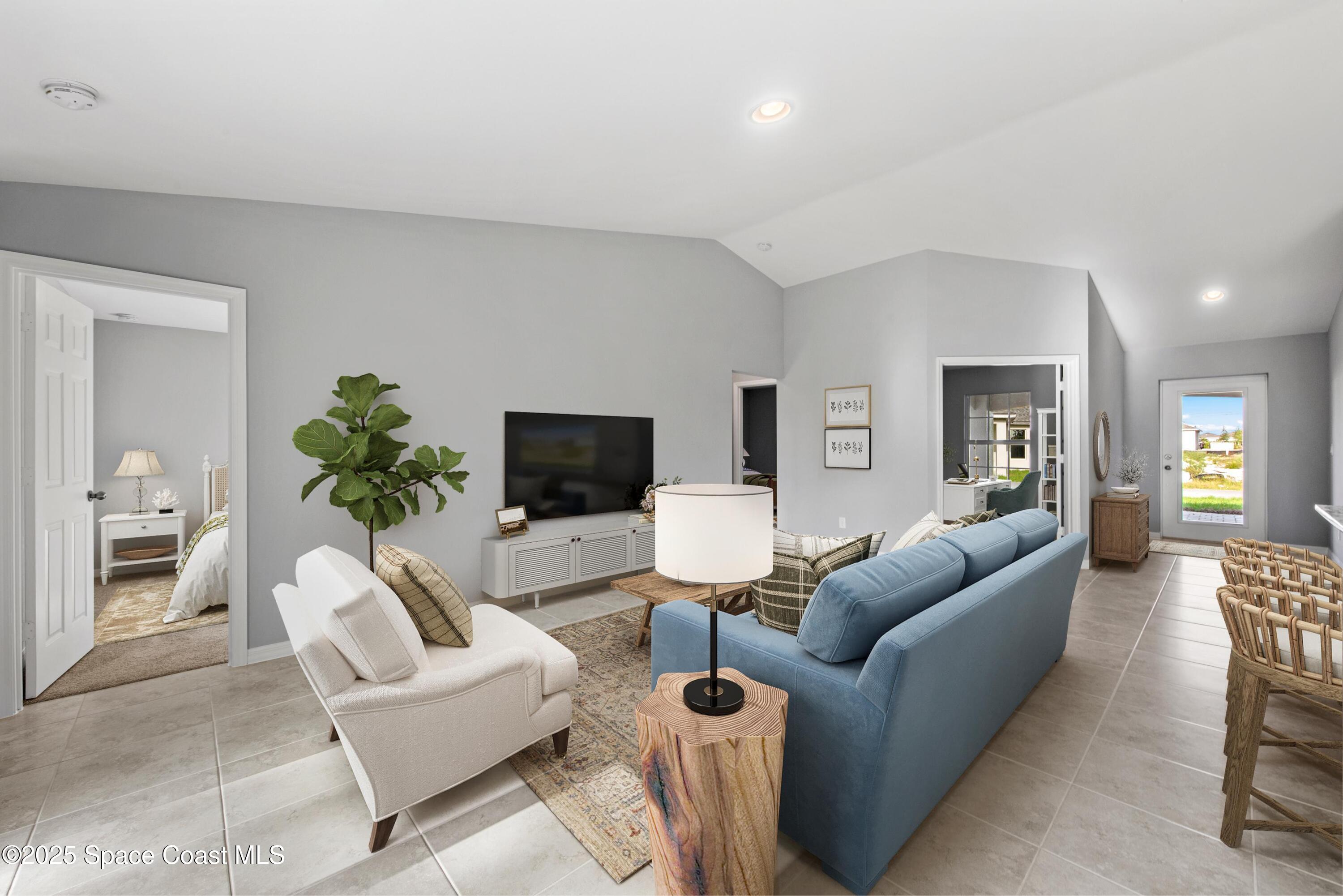 311 La Croix Road Southwest Palm Bay, FL 32908 - Photo 5 of 15 SL_CayoCosta_GreatRoom1