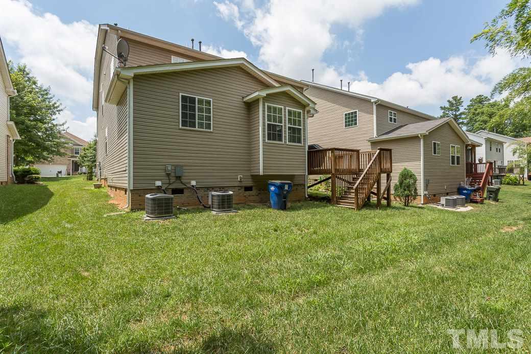 5716 Sea Fox Court Raleigh, NC 27616 - Photo 23 of 23 a view of a yard in front of house