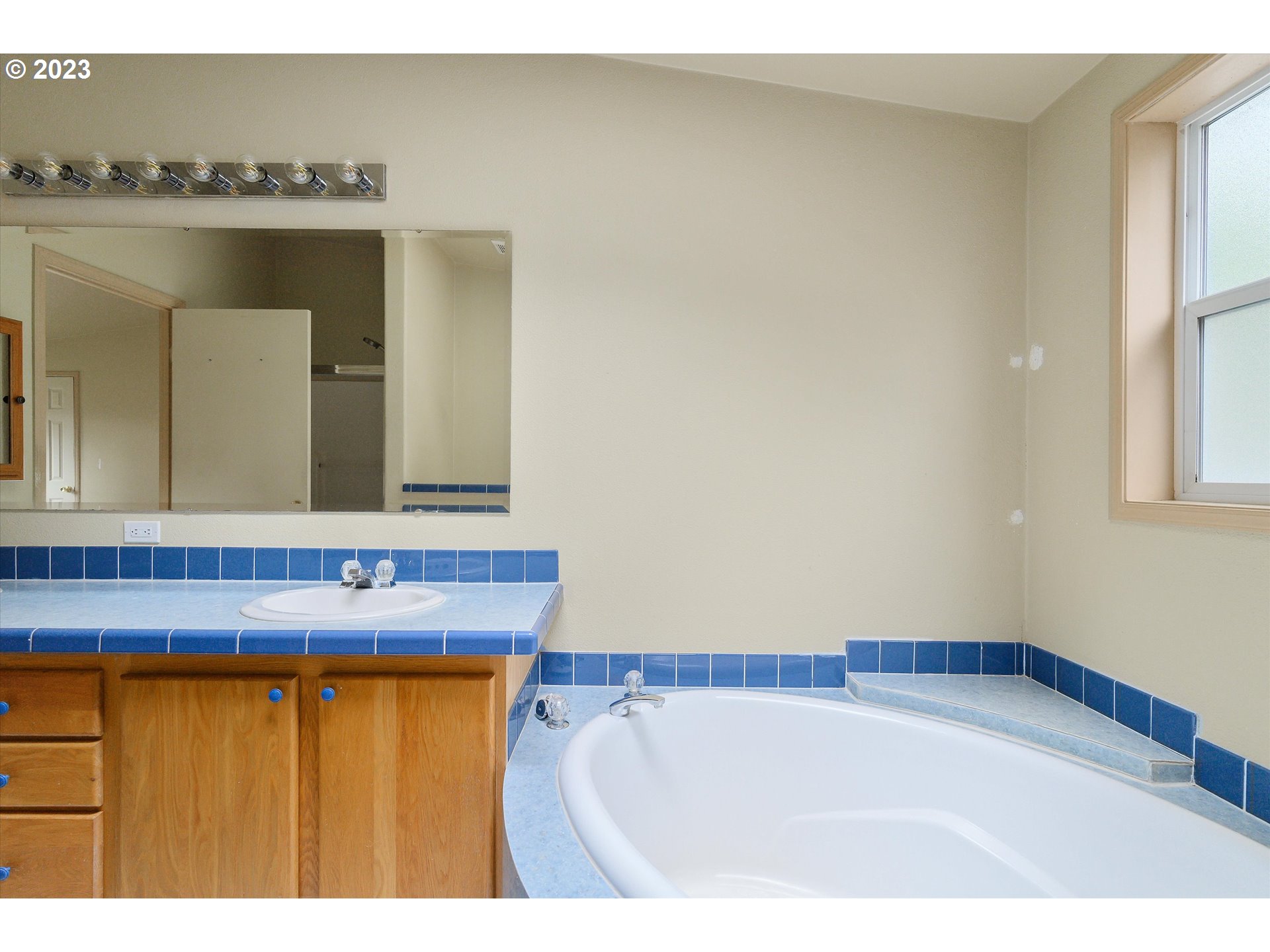 42264 Southeast Locksmith Lane Sandy, OR 97055 - Photo 17 of 36 a bathroom with a sink and a mirror