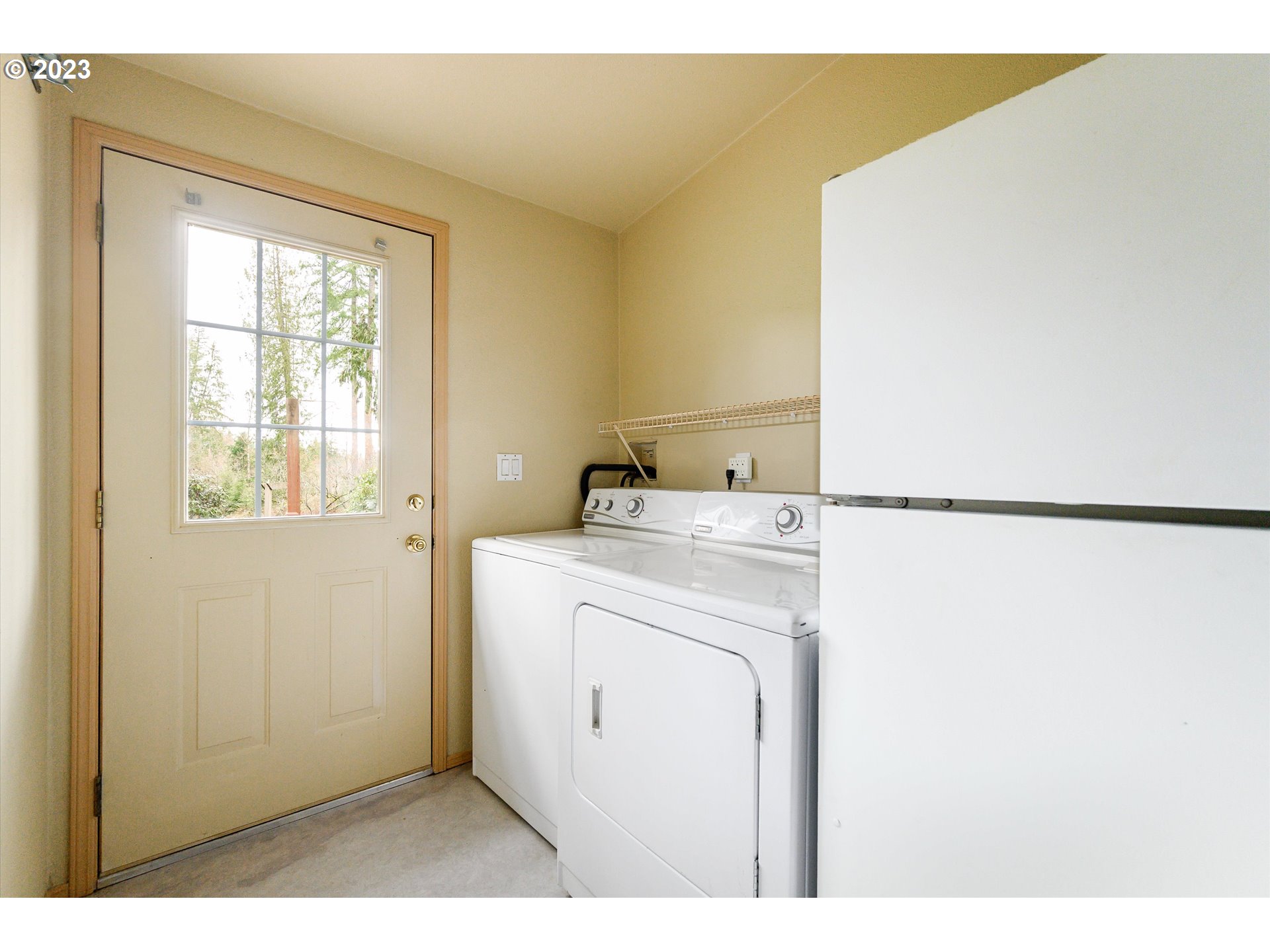 42264 Southeast Locksmith Lane Sandy, OR 97055 - Photo 22 of 36 a utility room with dryer and washer