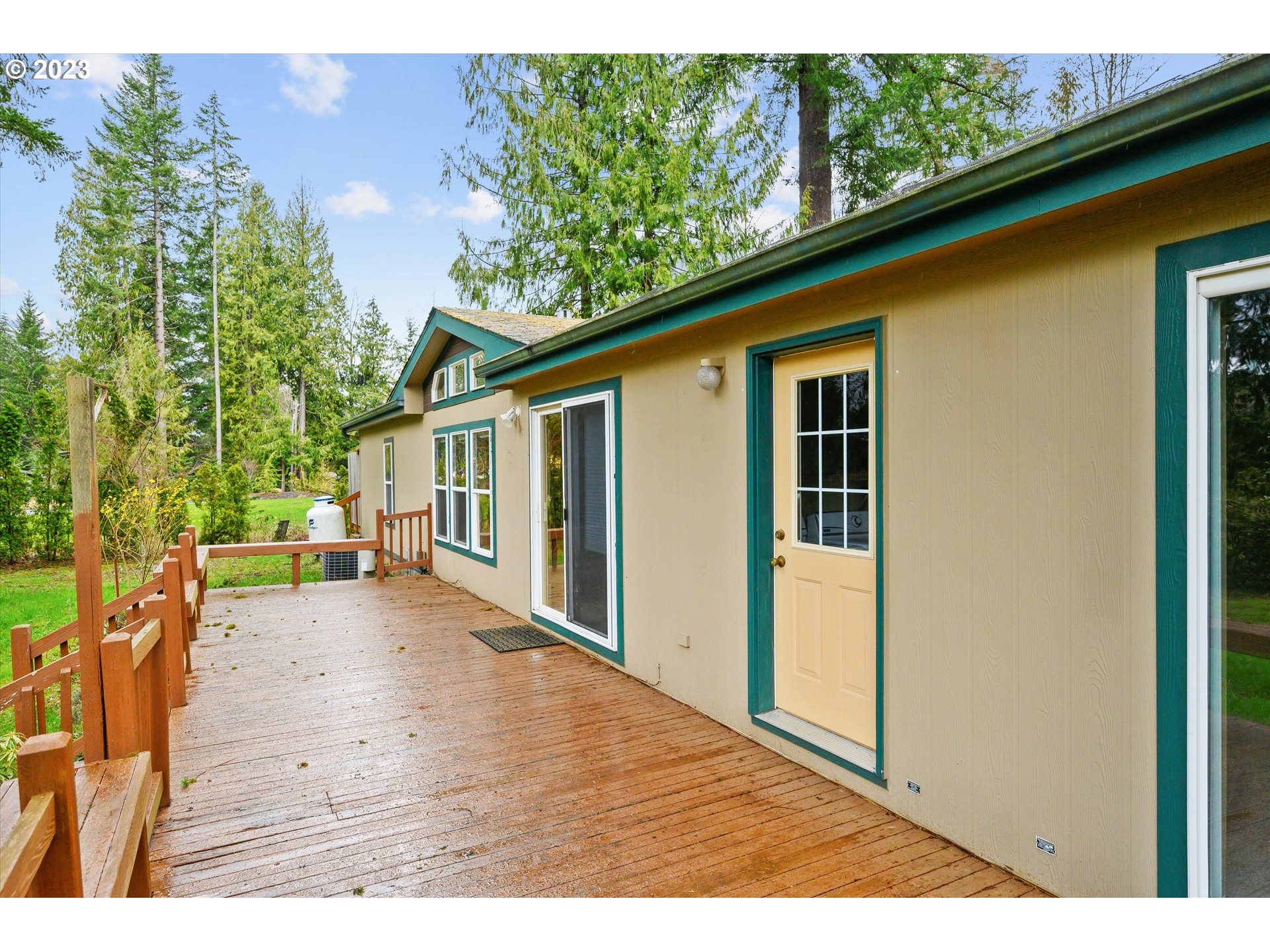 42264 Southeast Locksmith Lane Sandy, OR 97055 - Photo 23 of 36 a view of a house with a backyard