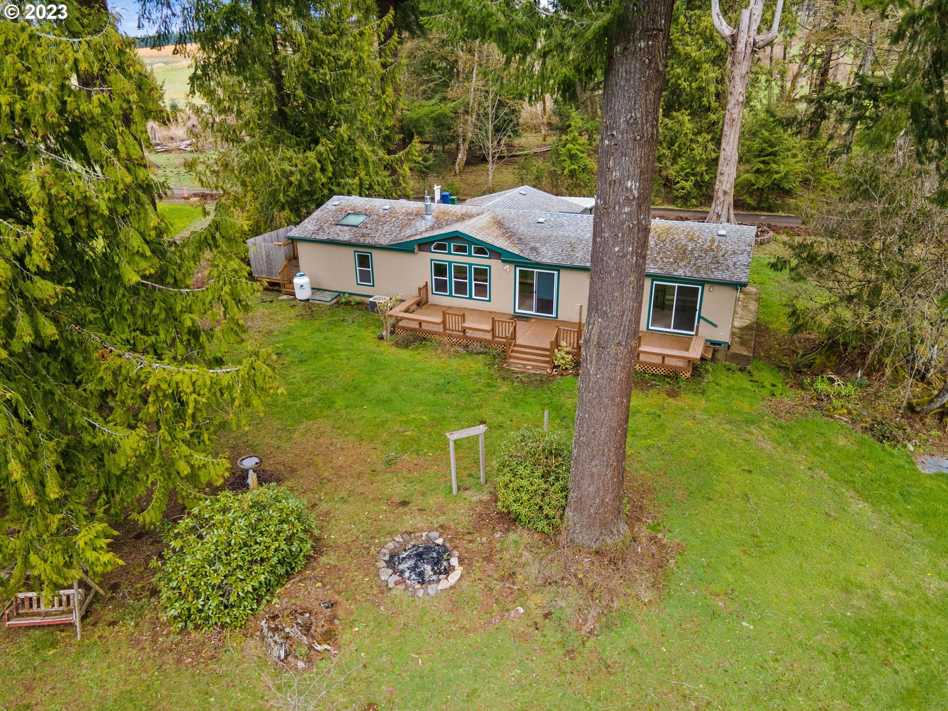 42264 Southeast Locksmith Lane Sandy, OR 97055 - Photo 26 of 36 front view of a house with a yard