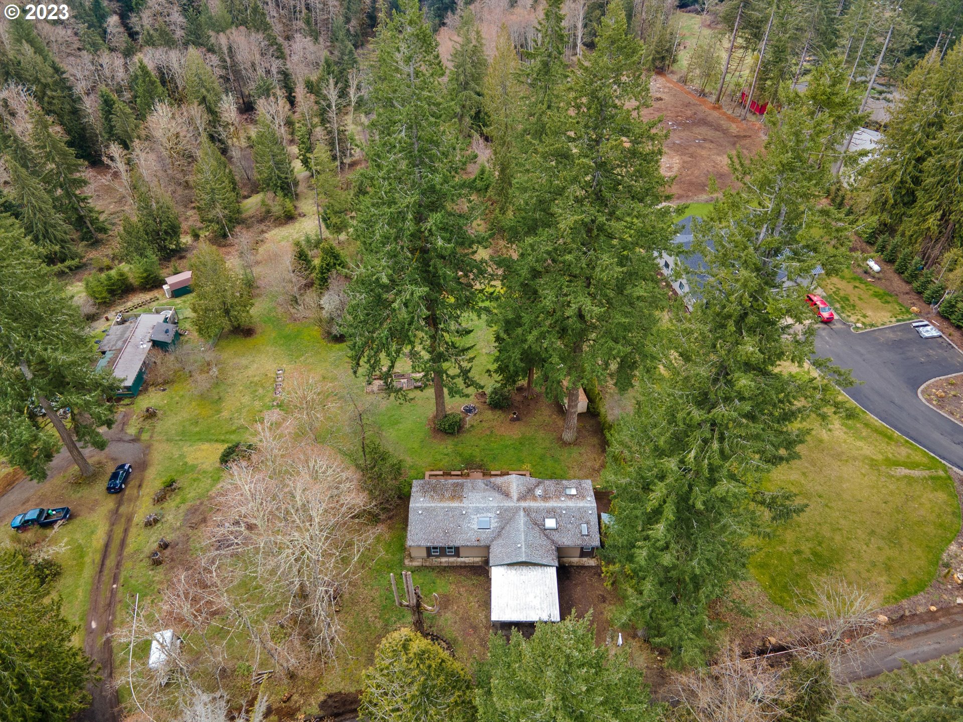 42264 Southeast Locksmith Lane Sandy, OR 97055 - Photo 34 of 36 an aerial view of a house with a yard