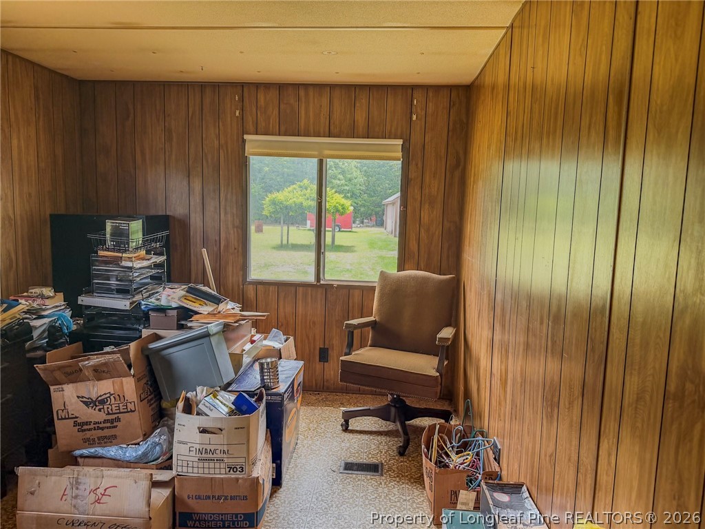 1308 Mac D Road Orrum, NC 28369 - Photo 13 of 32 a workspace with furniture and a window