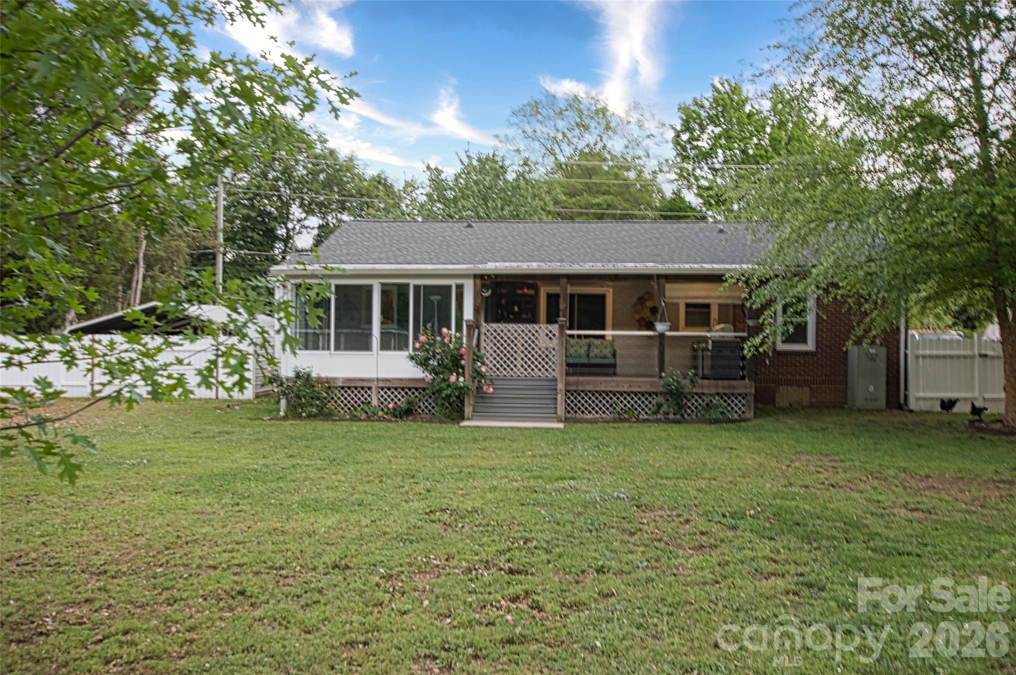 204 Clinton Avenue Clover, SC 29710 - Photo 22 of 26 a view of a house with a backyard