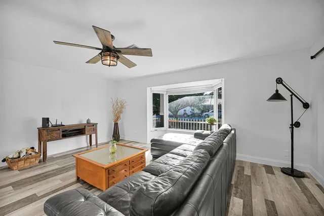 a bed room with a bed and a television