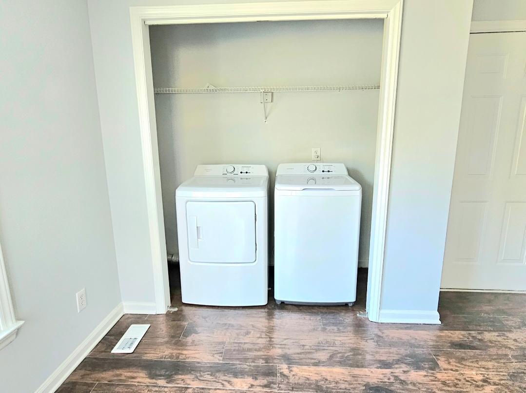 250 Pope Lake Road Angier, NC 27501 - Photo 5 of 8 a utility room with dryer and washer