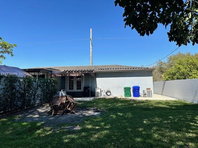 3440 Southwest 7th Street, Unit 1 Miami, FL 33135 - Photo 14 of 14 a view of a house with backyard and porch