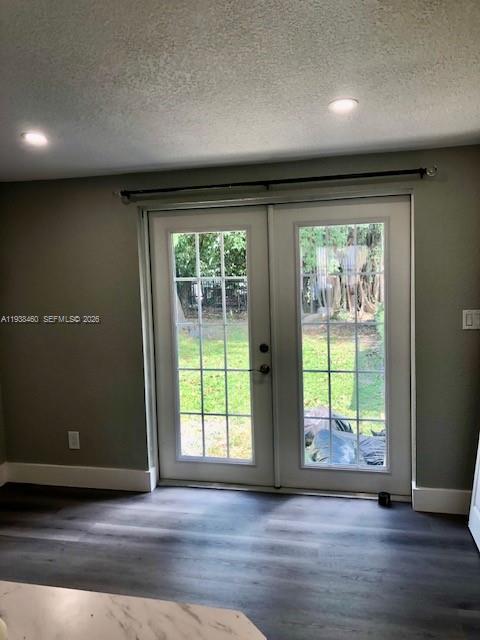 3440 Southwest 7th Street, Unit 1 Miami, FL 33135 - Photo 2 of 14 an empty room with wooden floor and windows