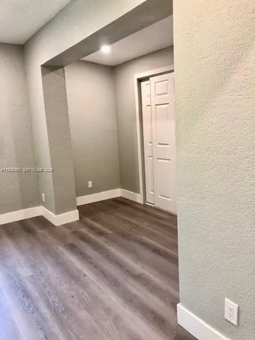 a bathroom with a shower and toilet