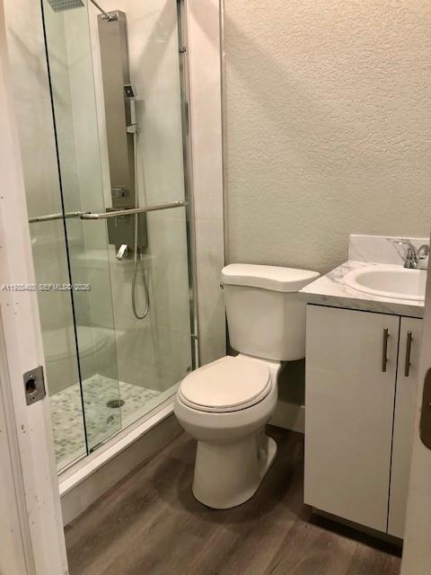 3440 Southwest 7th Street, Unit 1 Miami, FL 33135 - Photo 6 of 14 a bathroom with a toilet and a shower