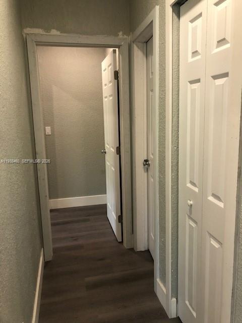 3440 Southwest 7th Street, Unit 1 Miami, FL 33135 - Photo 7 of 14 a view of a hallway with wooden floor