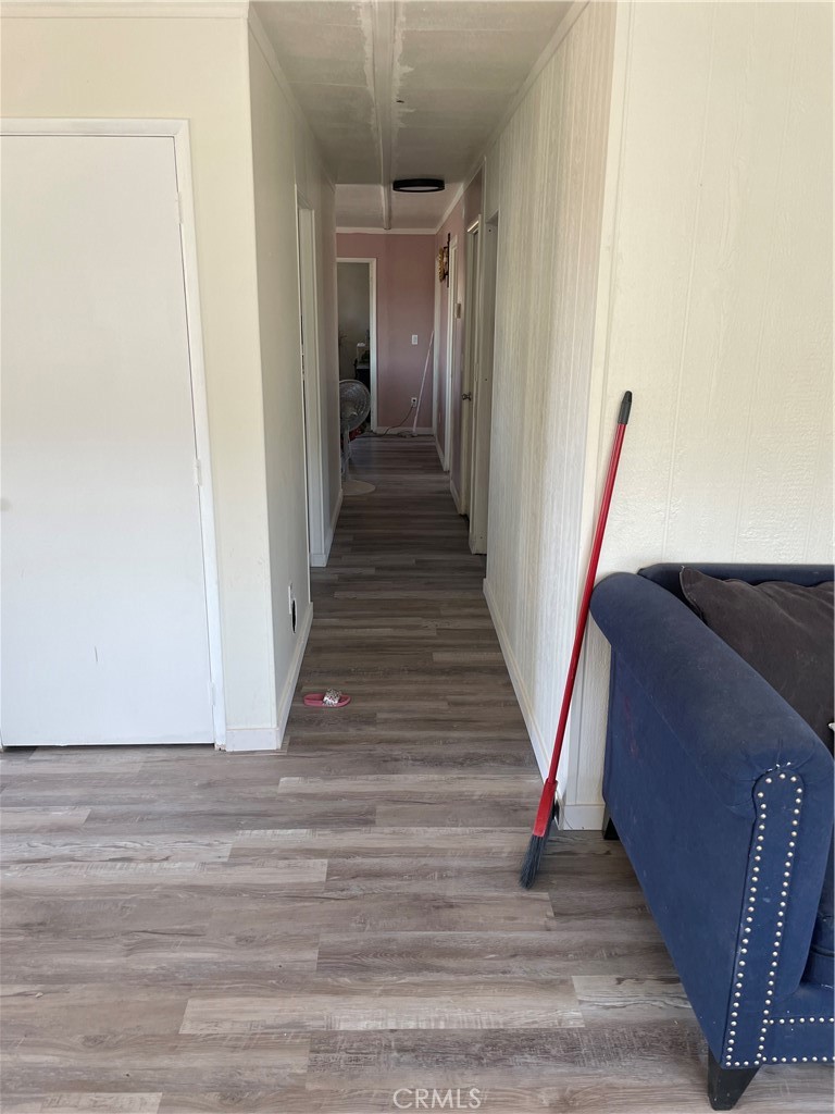 22861 Betty Road Perris, CA 92570 - Photo 11 of 13 a view of entryway and hall with wooden floor