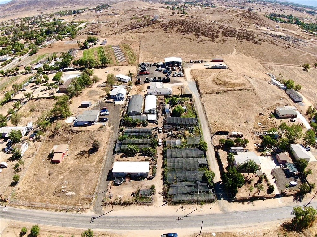 22861 Betty Road Perris, CA 92570 - Photo 4 of 13 an aerial view of residential houses with outdoor space