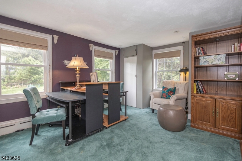 449 Stamets Road Milford, NJ 08848 - Photo 29 of 44 a view of a workspace with furniture and a window