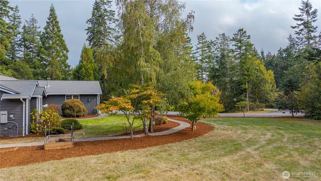 a view of a backyard with a patio