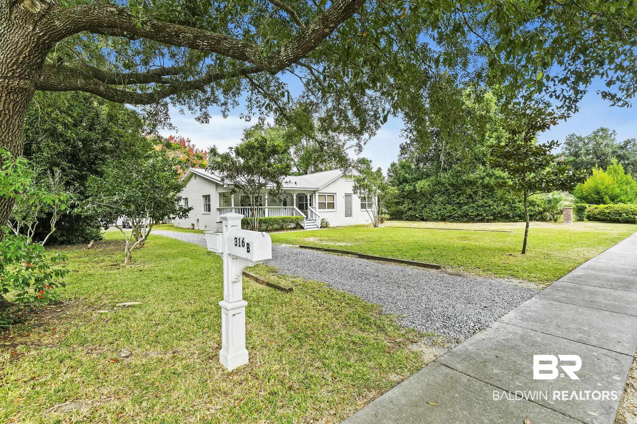 316 West Orchid Avenue Foley, AL 36535 - Photo 3 of 38 Ranch-style home with a front yard