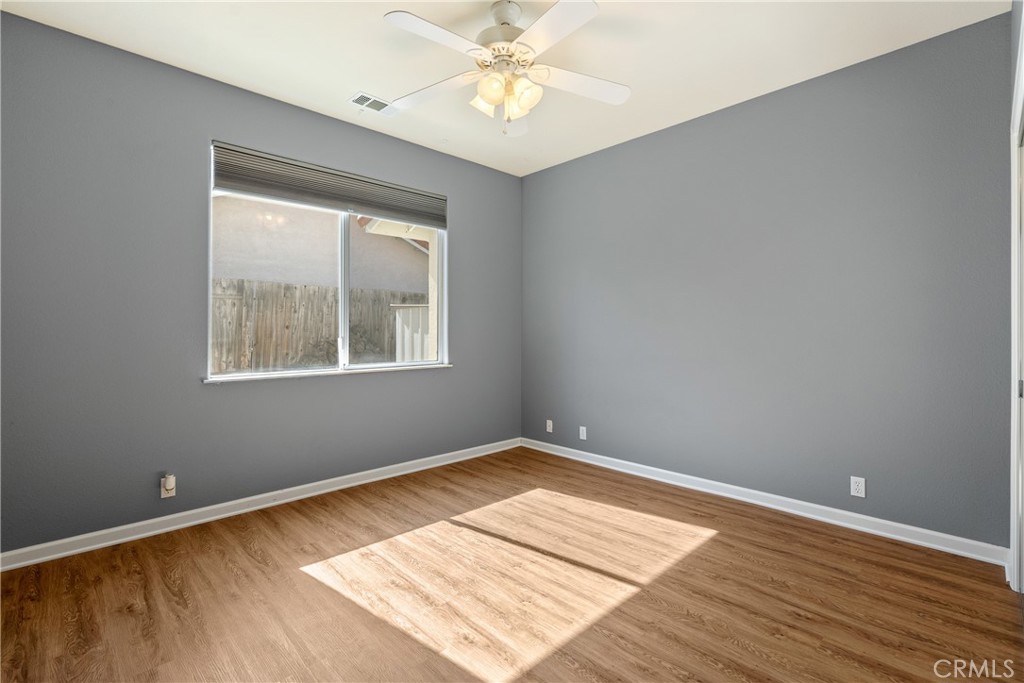 830 Sycamore Canyon Road Paso Robles, CA 93446 - Photo 16 of 27 a view of an empty room with window and wooden floor