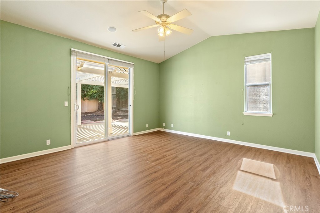 830 Sycamore Canyon Road Paso Robles, CA 93446 - Photo 18 of 27 a view of an empty room with wooden floor and a window